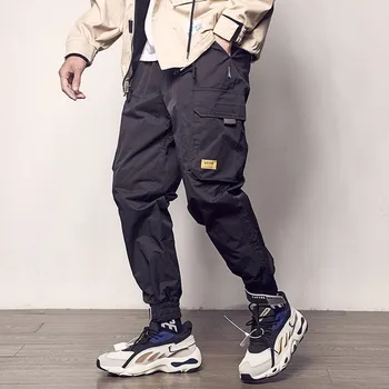 2021 tasku tunked mees värv segast vabaaja sörkimine mood tactical püksid trend Harajuku street casual püksid püksid